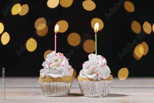 birthday cupcakes on wooden table