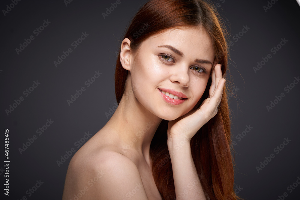 woman with bare shoulders and beautiful hairstyle close-up attractive look woman with bare shoulders and beautiful hairstyle close-up attractive look