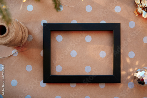 Christmas mockup frame on basic classic pattern. Festive aesthetic decorations. Silver mock up frame. Christmas atmosphere. Merry Christmas and home coziness concept photo