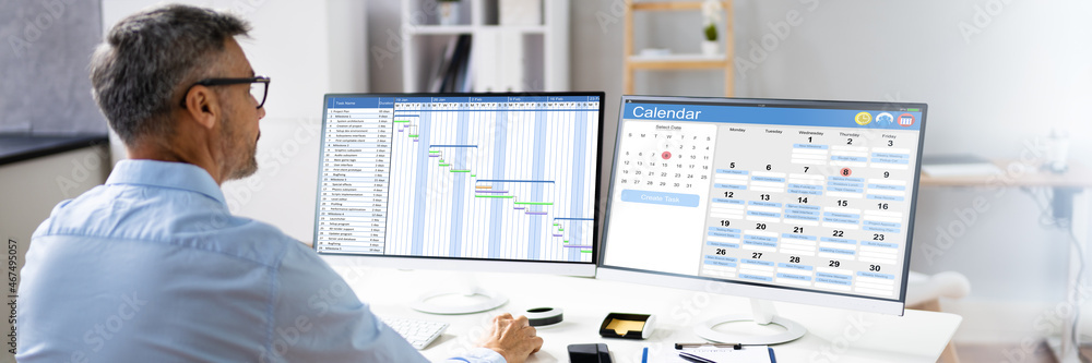 Fototapeta premium Employees Staff Schedule And Time Reports Or Computer