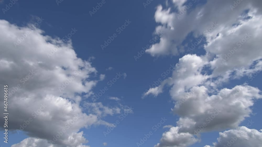 Clouds on sky time lapse at sunny summer day