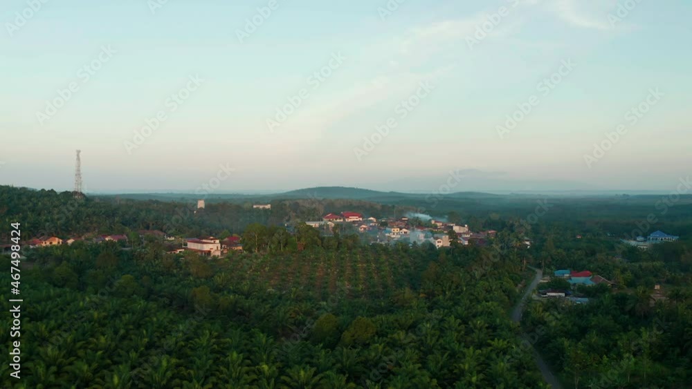 Sunrise aerial view of mountain, village houses at Pagoh, Muar, Malaysia Sunrise aerial view of mountain, village houses at Pagoh, Muar, Malaysia