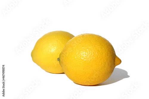 Juicy ripe yellow lemon lies on an isolated background.