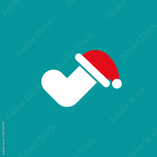 Tick Check Mark with Santa Hat. Funny Christmas valid Seal. Ok sticker icon isolated on white.
