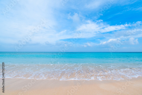 Beautiful tropical beach with clear blue sky and blue clear ocean at Hateruma Island, Okinawa, Japan. Very sunny day with nobody in the sight. Beach with waves