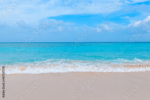 Beautiful tropical beach with clear blue sky and blue clear ocean at Hateruma Island, Okinawa, Japan. Very sunny day with nobody in the sight. Beach with waves