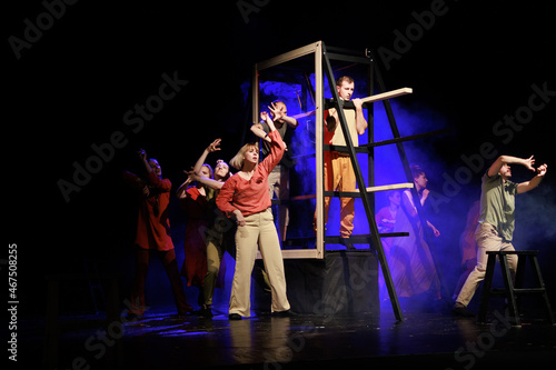 Canvas Print Actors and actresses perform a modern performance on the stage of the theater