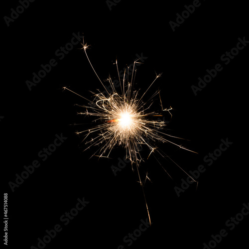 a sparkler on black background