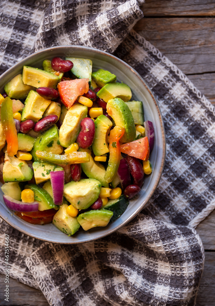 Avocado salad with other vegetables, tomatoes and corn. Healthy food Avocado salad with other vegetables, tomatoes and corn. Healthy food