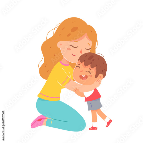 Mother hugging son with love and tenderness, hug from mom to boy, parent sitting on knees