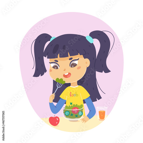 Kid eating healthy food on lunch, dinner or breakfast, girl sitting at table to eat salad