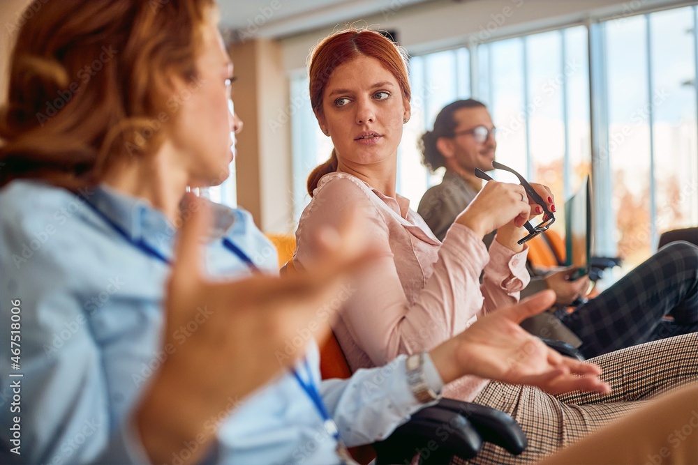 Business woman communicating together in creative office. Business woman communicating together in creative office.