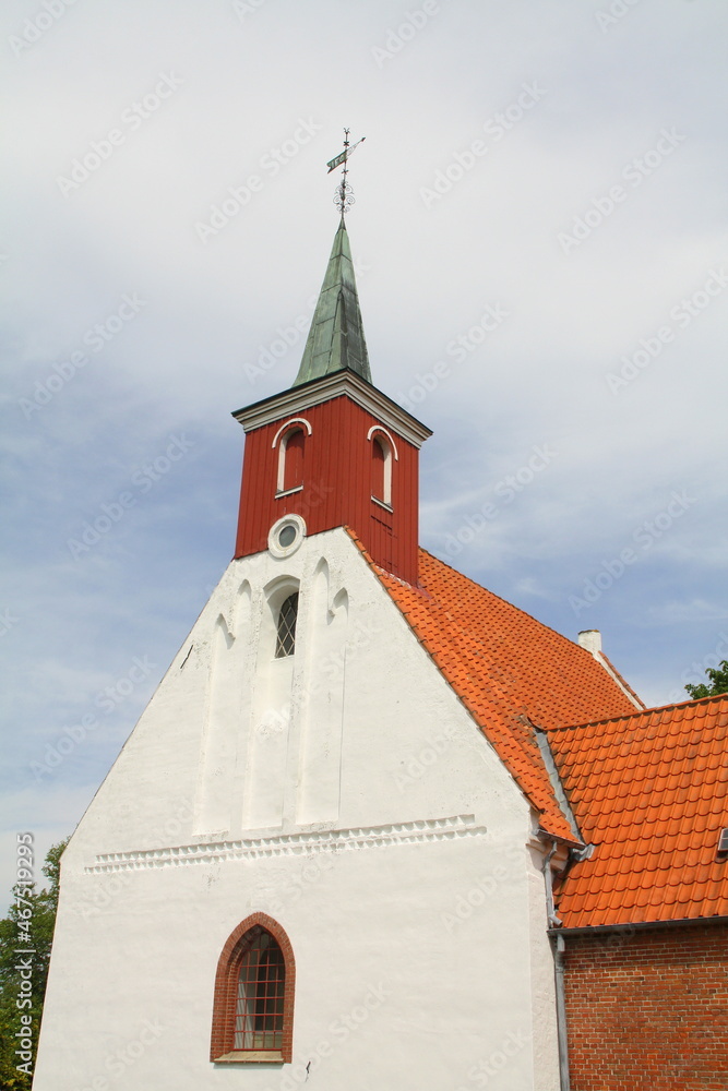 Fototapeta premium Church tower of the Karleby Kirke in Nykøbing on the island Falster. Denmark