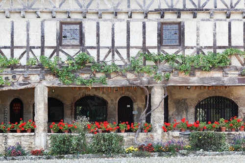 House in the medieval village of Perouges in France photo