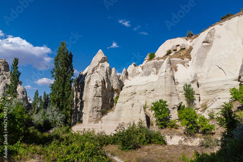 Amazing volcanic rock formations known as Love Valley in Cappadocia  Turkey. View from canyon to rocks with rooms inside.