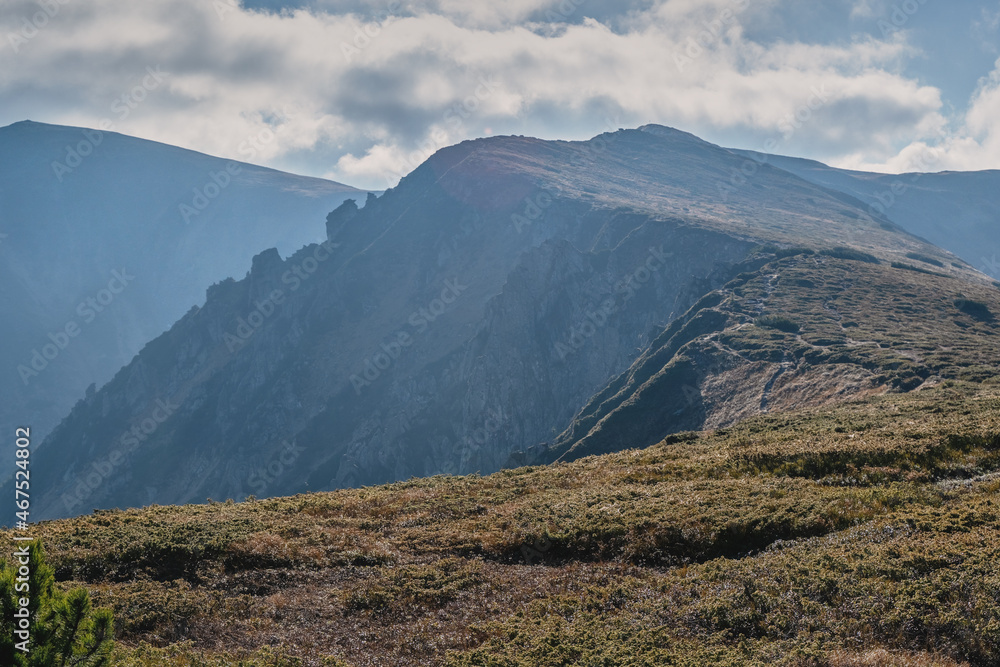 Chornogora ridge. Sunny autumn day in the mountains. Ukrainian Carpathian mountains. Chornogora ridge. Sunny autumn day in the mountains. Ukrainian Carpathian mountains.