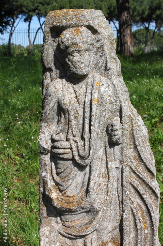 Ancient statue of a roman senator in Ostia Antica. Rome, Italy