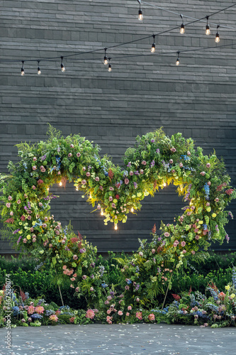 Wedding ceremony arch. Floral decoration design outdoors