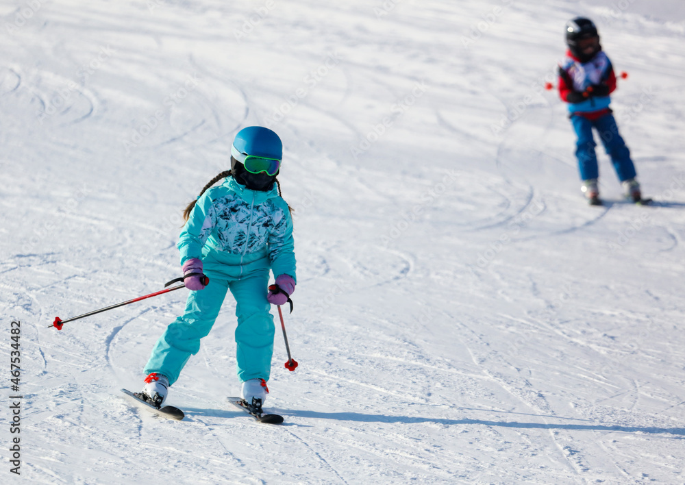 A man is skiing in the snow