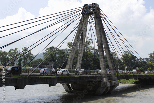 Bridge leading to Swami Vivekanand Park. Haridwar, India  photo