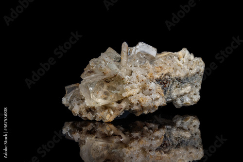 Macro mineral stone fluorite with quartz against black background