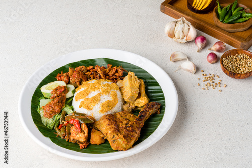 Canvas Print Nasi Padang with  chicken rendang  is an Indonesian food from West Sumatra in Indonesia