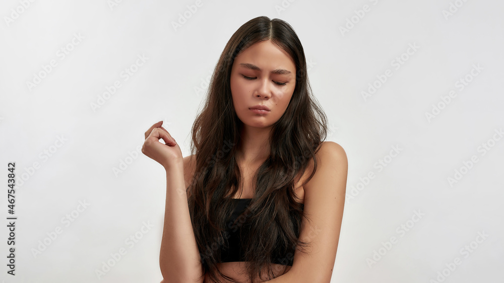 Unhappy Asian woman feel bored and distressed Unhappy Asian woman feel bored and distressed