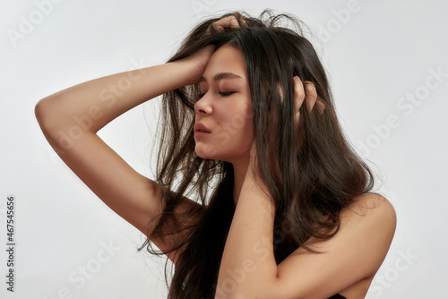 Millennial Asian woman model on white background
