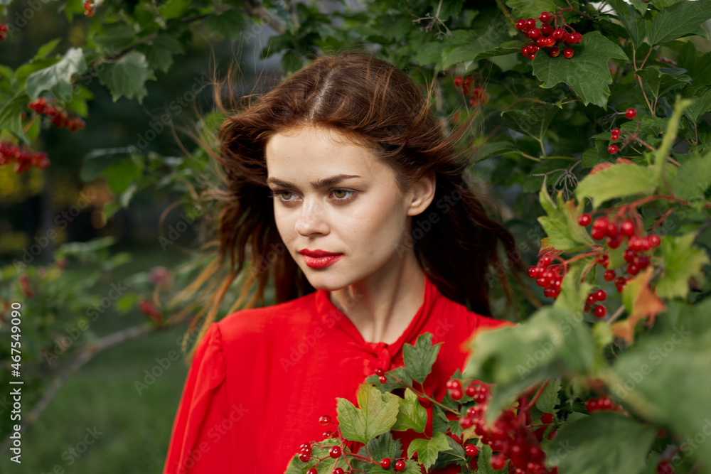 pretty woman in red shirt nature green leaves summer pretty woman in red shirt nature green leaves summer