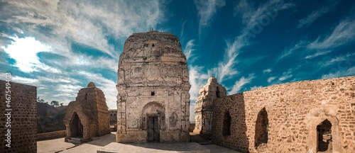 Choa SaidanShah, Chakwal, Pakistan - December, 29, 2019: Shri Katas Raj is a complex of several Hindu temples and  a pond named Katas which is sacred to Hindus. The site is almost 5000 years old! photo