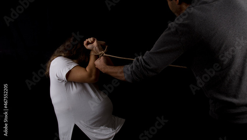 black and white photo of man who abuses pregnant woman