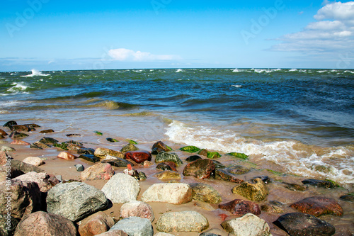Fototapeta Naklejka Na Ścianę i Meble -  Wild coast on cape Kolka with a rocky shore of the Baltic Sea. Cape Kolka - the meeting place of the Baltic sea and the Gulf of Riga, Latvia.