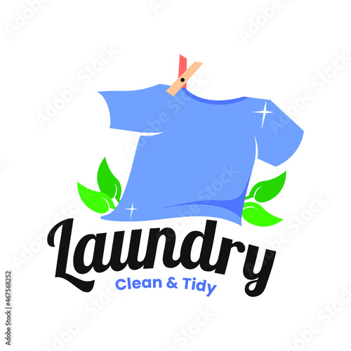 Laundry Logo Template, With A Clean Blue T-Shirt Mascot Being Dried
