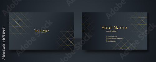 Modern Business Card - Creative and Clean Business Card Template. Luxury business card design template. Elegant dark back background with abstract golden wavy shapes lines shiny. Vector illustration
