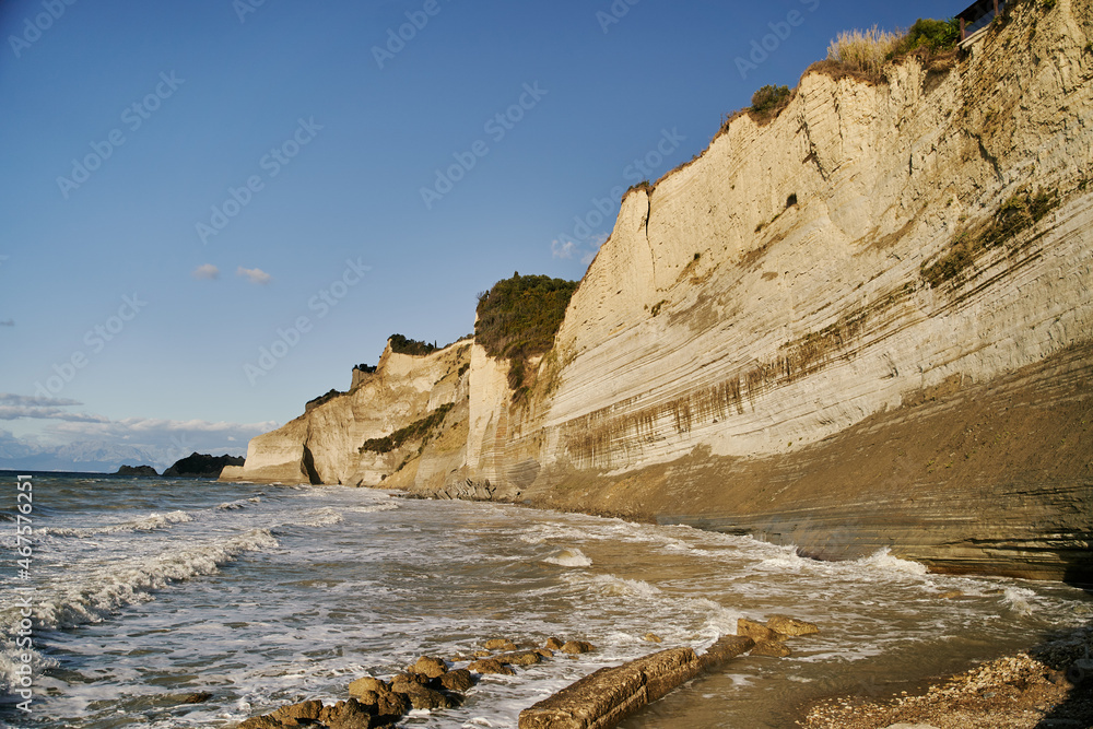 View of Logas Beach and the amazing rocky cliff in Peroulades. Corfu island. Greece