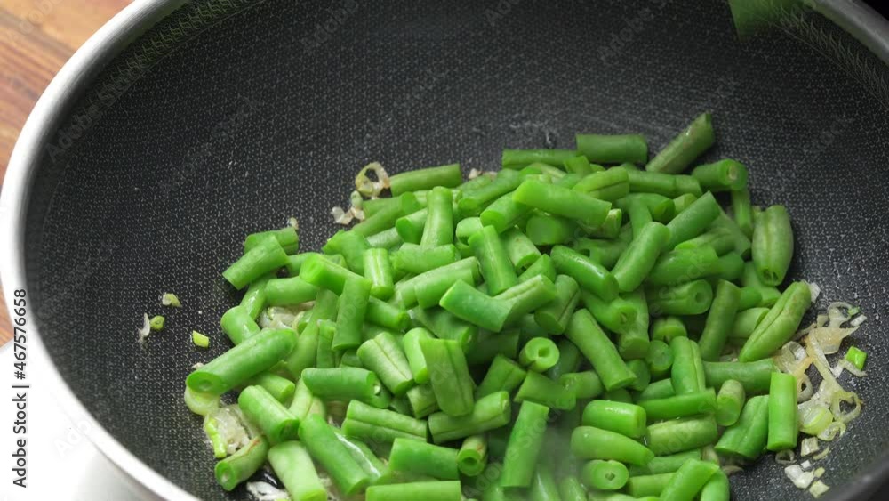 Chinese family special stir-fried vegetables and squid stir-fried string beans