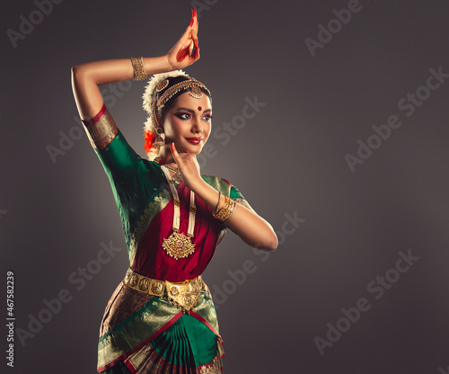 Beautiful indian girl dancer of Indian classical dance bharatanatyam . Culture and traditions of India.	
 photo