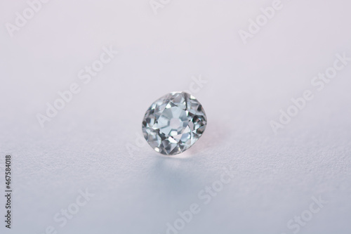 Antique vintage white old days diamond loose stone setting with polished culet. Transparent precious natural cushion faceted European cut gemstone. Hardness 10. White paper background.