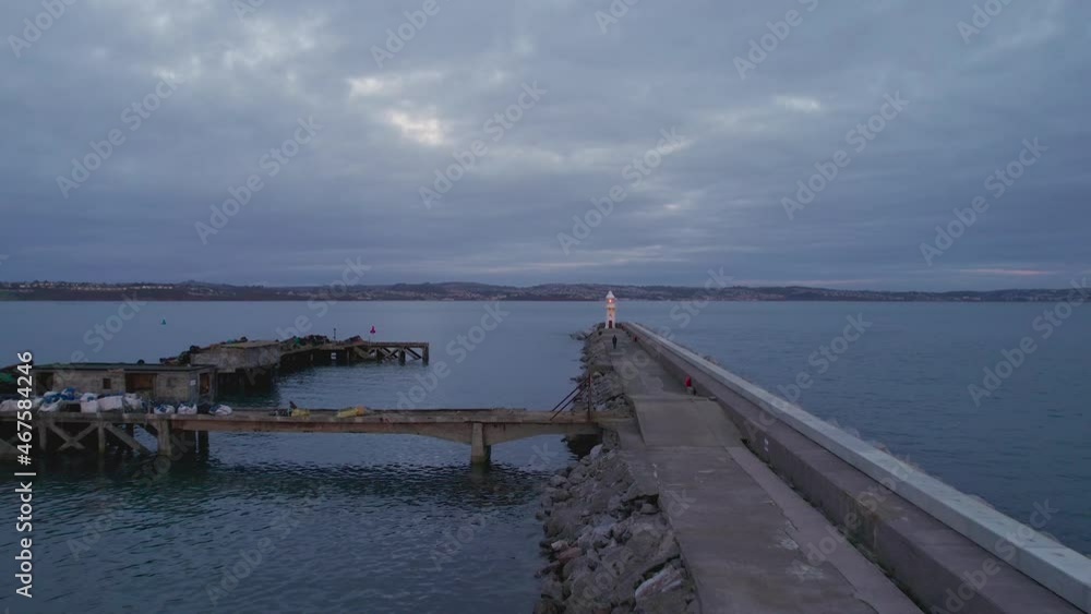 SUNRISE over BRIXHAM LIGHTHOUSE from a drone, Brixham, Devon, England, Europe SUNRISE over BRIXHAM LIGHTHOUSE from a drone, Brixham, Devon, England, Europe