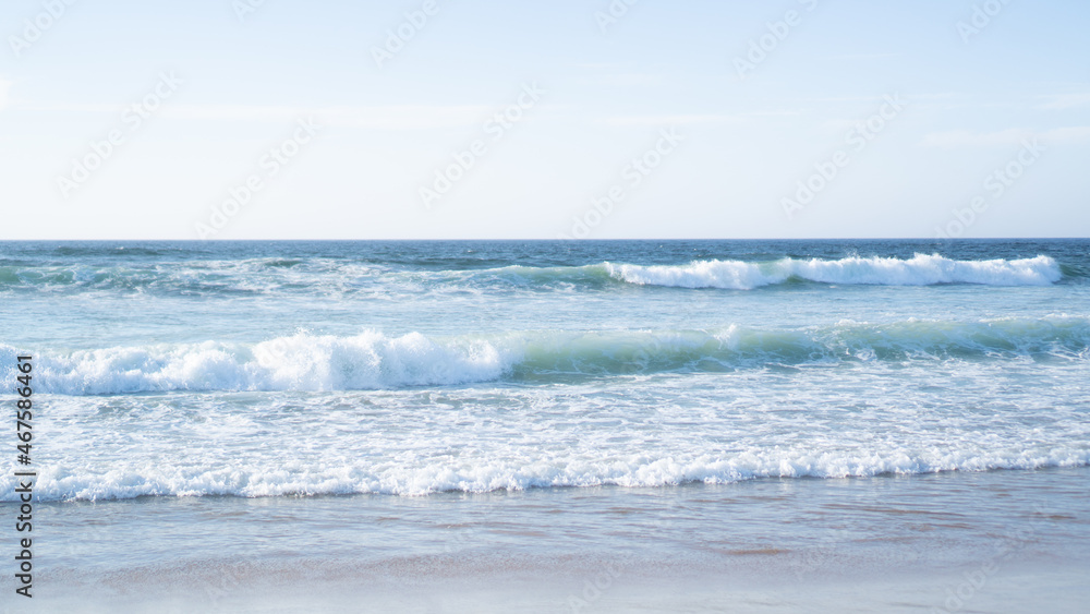 Raging ocean waves. Raging waters. White bureaucratic waves of the sea. Abstract blue sea water with white wave Raging ocean waves. Raging waters. White bureaucratic waves of the sea. Abstract blue sea water with white wave