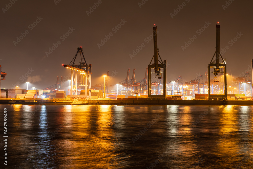Hamburg harbor: container terminal in the port of Hamburg at night	