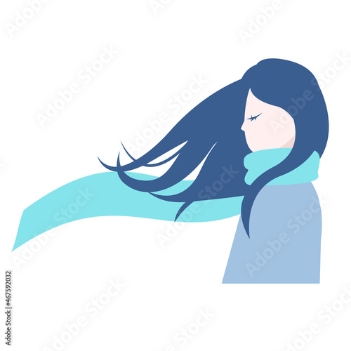 マフラーを巻いた横向きの女性