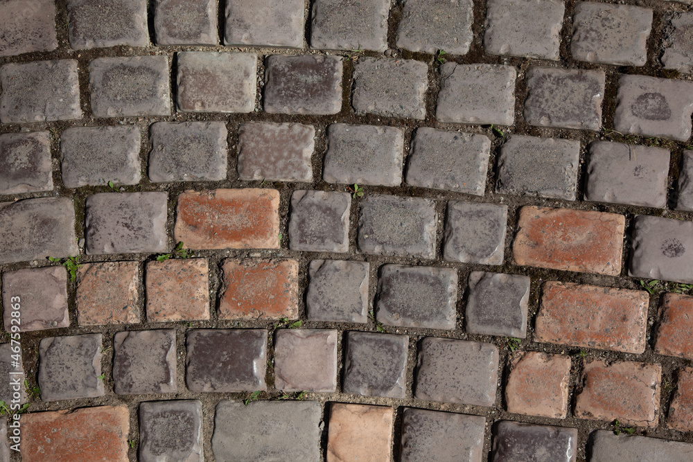 Paving texture of worn rectangular and square stones Paving texture of worn rectangular and square stones