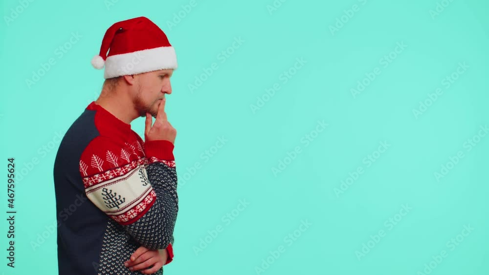 Eureka. Man in red Christmas sweater make gesture raises finger came up with creative plan feels excited with good idea, inspiration motivation isolated on blue background. Happy New Year celebration Eureka. Man in red Christmas sweater make gesture raises finger came up with creative plan feels excited with good idea, inspiration motivation isolated on blue background. Happy New Year celebration