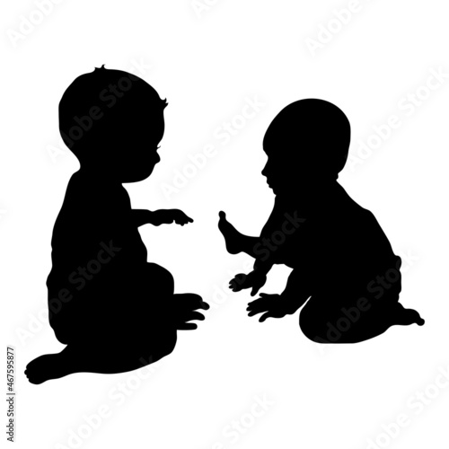 vector silhouettes of little boys during the game. Children under one year old sit on the floor and look at each other.