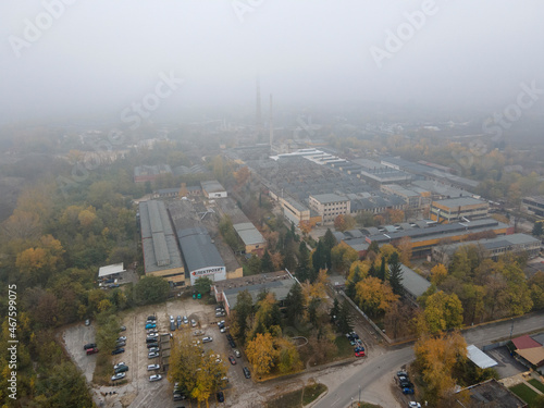 Obraz na płótnie Aerial view of town of Pazardzhik, covered with fog, Bulgaria w salonie