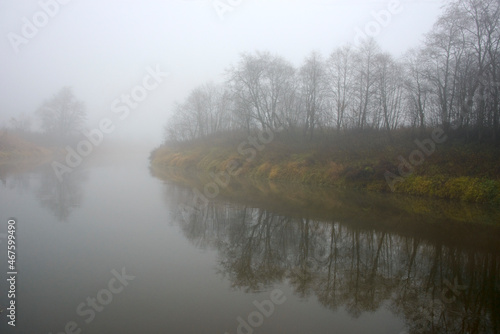 the Russian landscape - the river and the wood in the fall