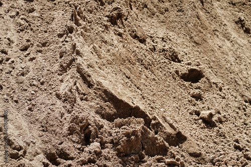 Closeup of cement and stones mixture used for a building structure process photo