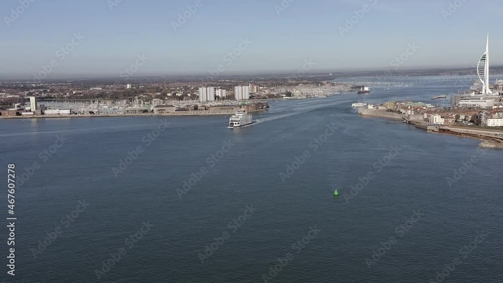 Ferry departing Portsmouth harbour and heading towards the Isle of Wight. Aerial footage. Ferry departing Portsmouth harbour and heading towards the Isle of Wight. Aerial footage.