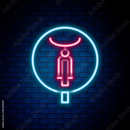 Glowing neon line Bicycle icon isolated on brick wall background. Bike race. Extreme sport. Sport equipment. Colorful outline concept. Vector